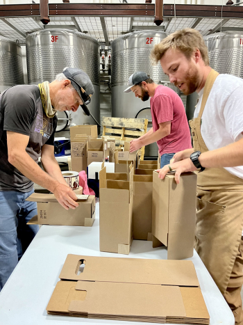Cellar team making Patelin red boxes