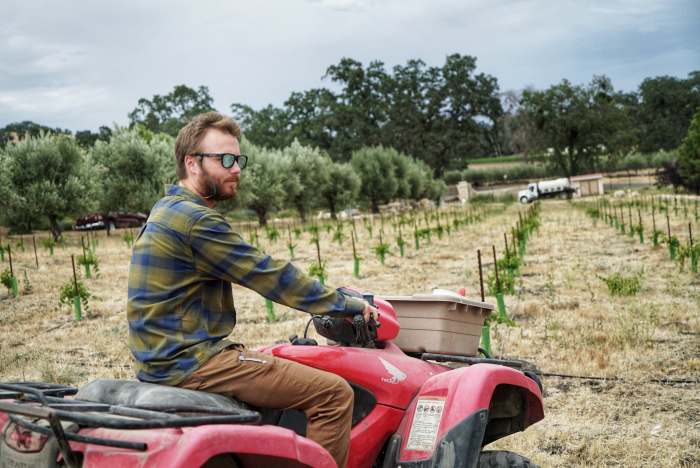 Austin Collins on a quad