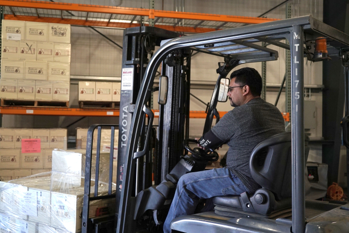Eddie Garcia at Tablas Creek on a Forklift