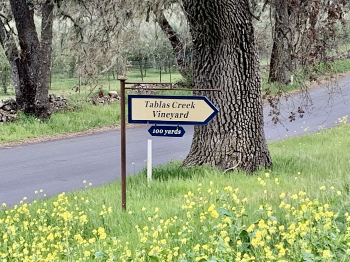 Tablas Creek sign with wildflowers