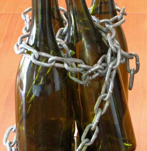 Wine bottles in chains