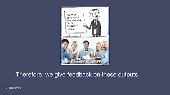 A comic showing a man standing in front of a whiteboard with the text "We must feed cows with chocolate to get chocolate milk." Below him, a group of seated people are smiling awkwardly with the caption "Please somebody kill us."