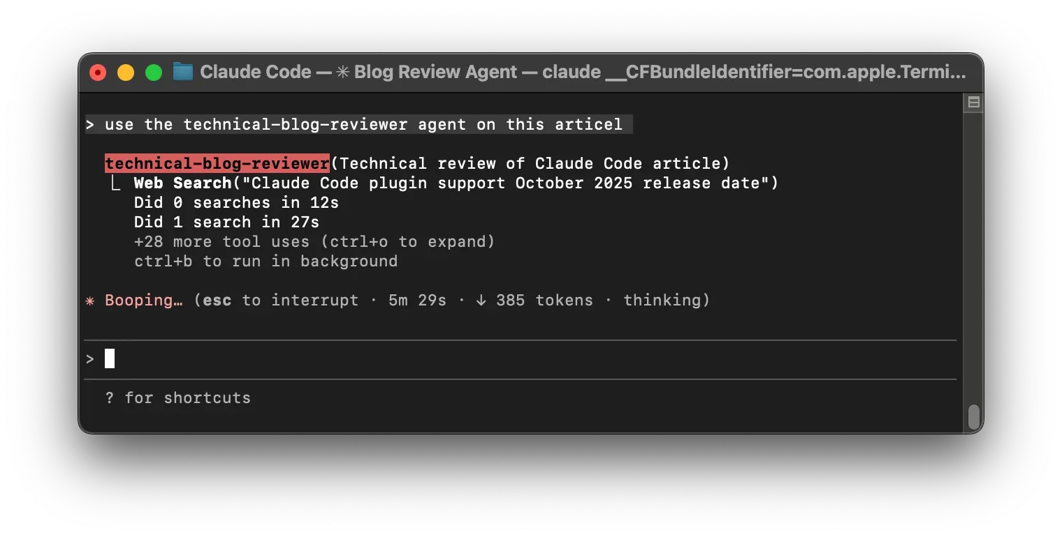 A screenshot of the technical-blog-reviewer sub-agent running in the background with the main Claude agent waiting for results.