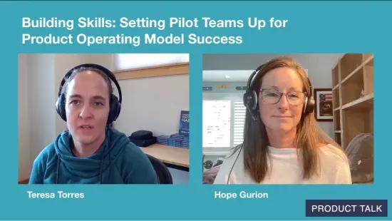 A video still of Teresa Torres and Hope Gurion discussing how to set pilot teams up for success in a product operating model transformation. Both are wearing headsets and appear side-by-side on a teal background with the title "Building Skills: Setting Pilot Teams Up for Product Operating Model Success" and the Product Talk logo.