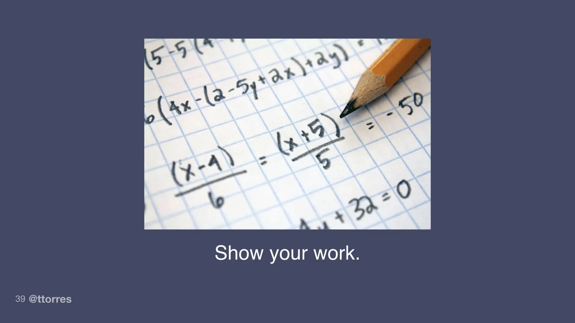 An algebra problem handwritten on a piece of graph paper