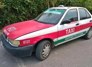¡ATRACAN A TAXISTA!