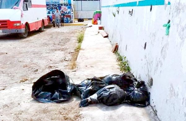 ¡DEJAN BOLSAS CON UN CUERPO DESCUARTIZADO EN PAPANTLA!