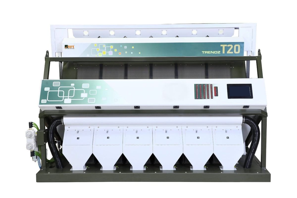 A front-facing view of an industrial colour-sorting machine with six numbered discharge chutes and a touchscreen control panel.