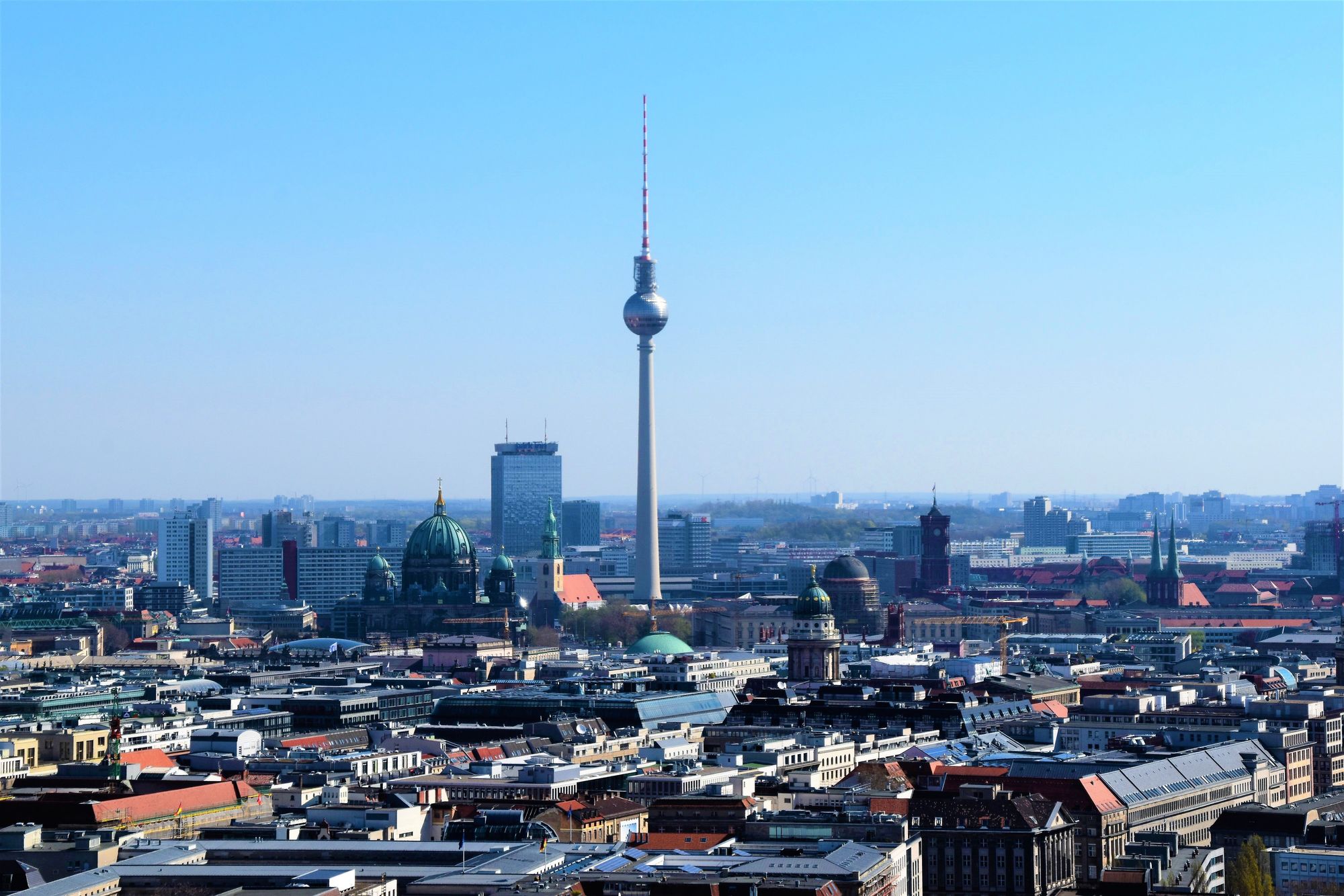city scape with telecoms mast in the centre