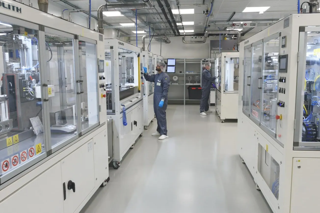 Technicians prepare battery pouches in a lab at Fraunhofer