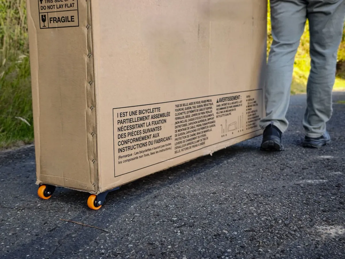 700 Grams That Turn Your Cardboard Bike Box Into a Rolling Suitcase