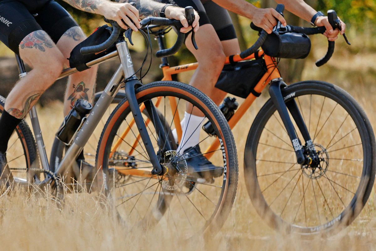 a person riding on the back of a bicycle