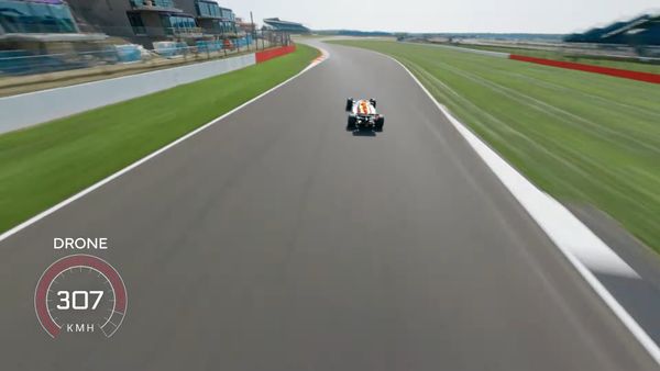World's Fastest Camera Drone Vs F1 Car (ft. Max Verstappen)