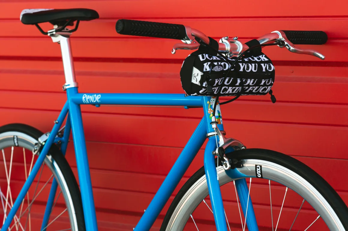 a bicycle parked on the side of a building