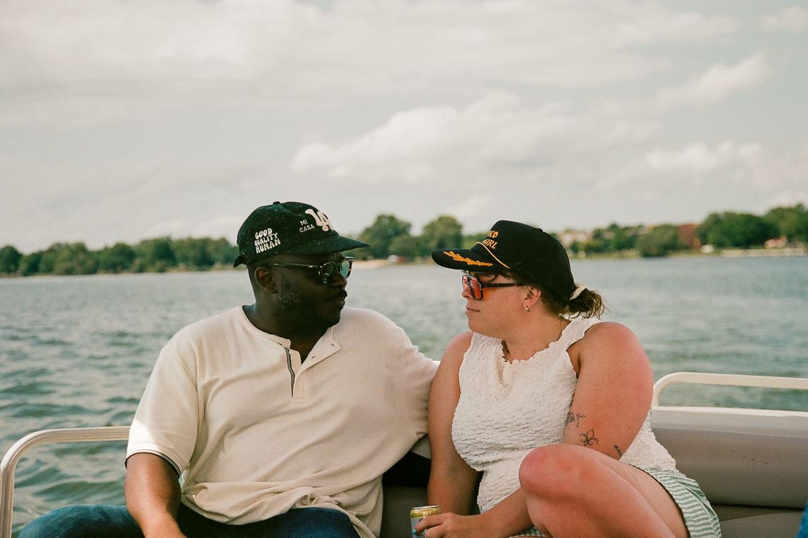 "Couple Sitting, Gazing"
