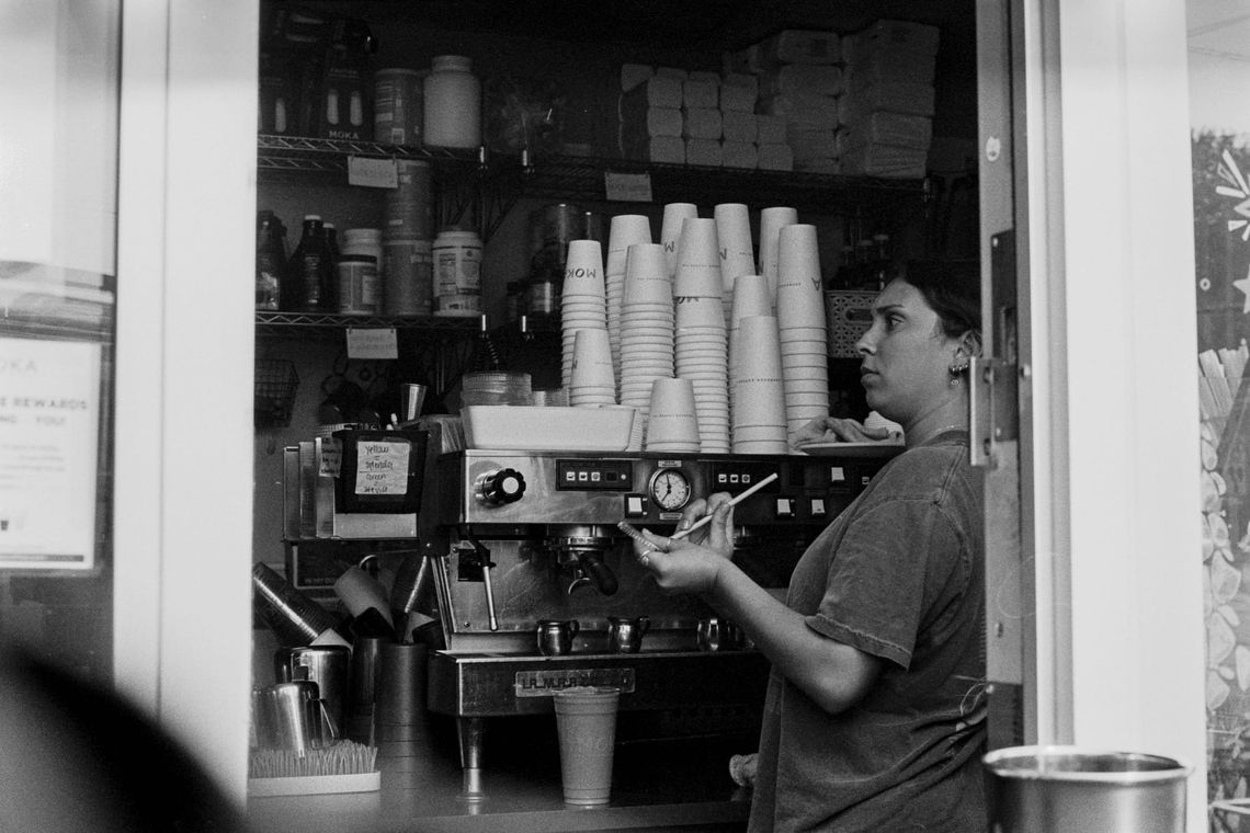 "Woman Making Coffee"