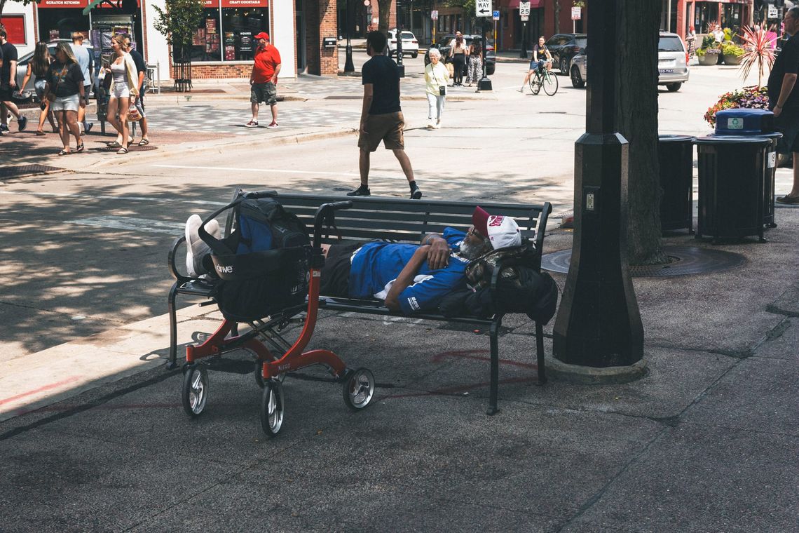 "Man on Bench, Sleeping"
