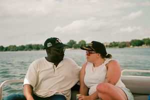 "Couple Sitting, Gazing"
