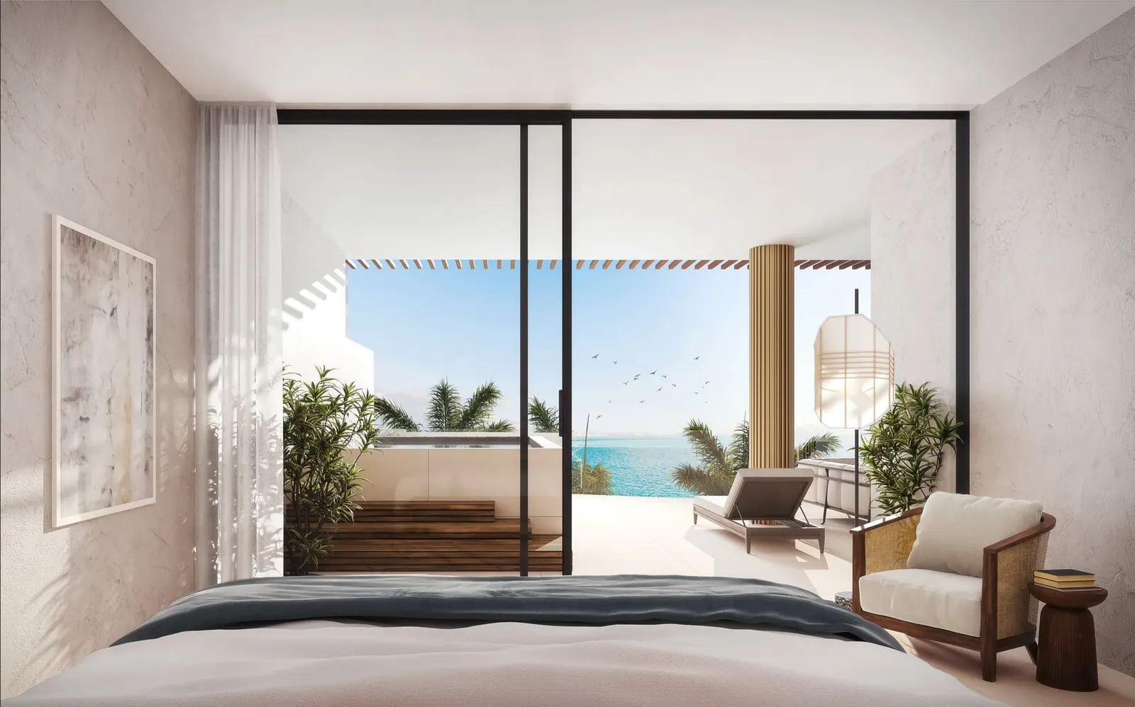 A Sky Villa bedroom at Arc, with floor-to-ceiling glass opening onto a terrace and the sea
