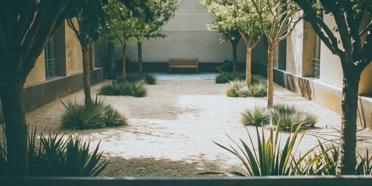 A beautiful, fire-safe yard with low-maintenance landscaping, gravel, and fire-resistant plants.