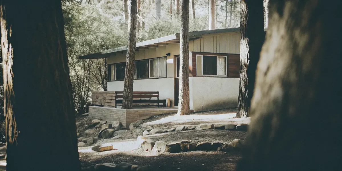Modern home built with fire resistant materials and surrounded by defensible space.