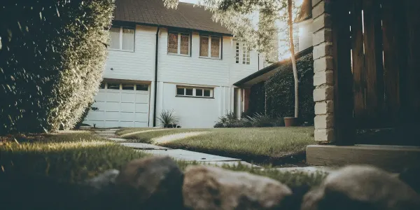 A home's yard cleared to comply with new defensible space regulations.