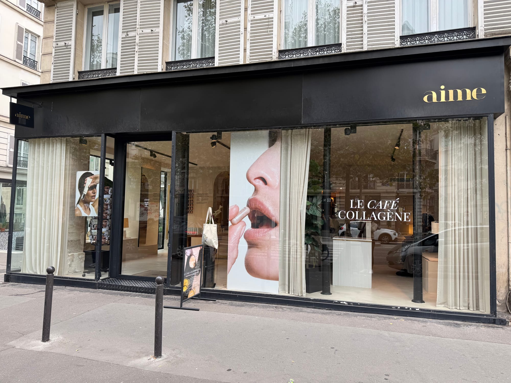 Aime skincare store front in Paris with glass windows and skincare posters