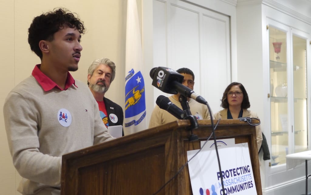 Milford High School Student Marcelo Gomes da Silva addresses activists gathered at the State House.