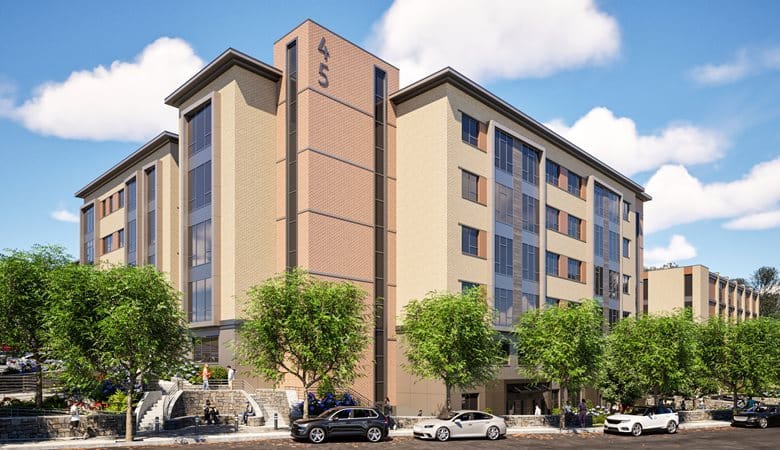 Rendering of proposed 45 Townsend Street building shows yellow-brick building, pedestrians and cars on tree-lined street.