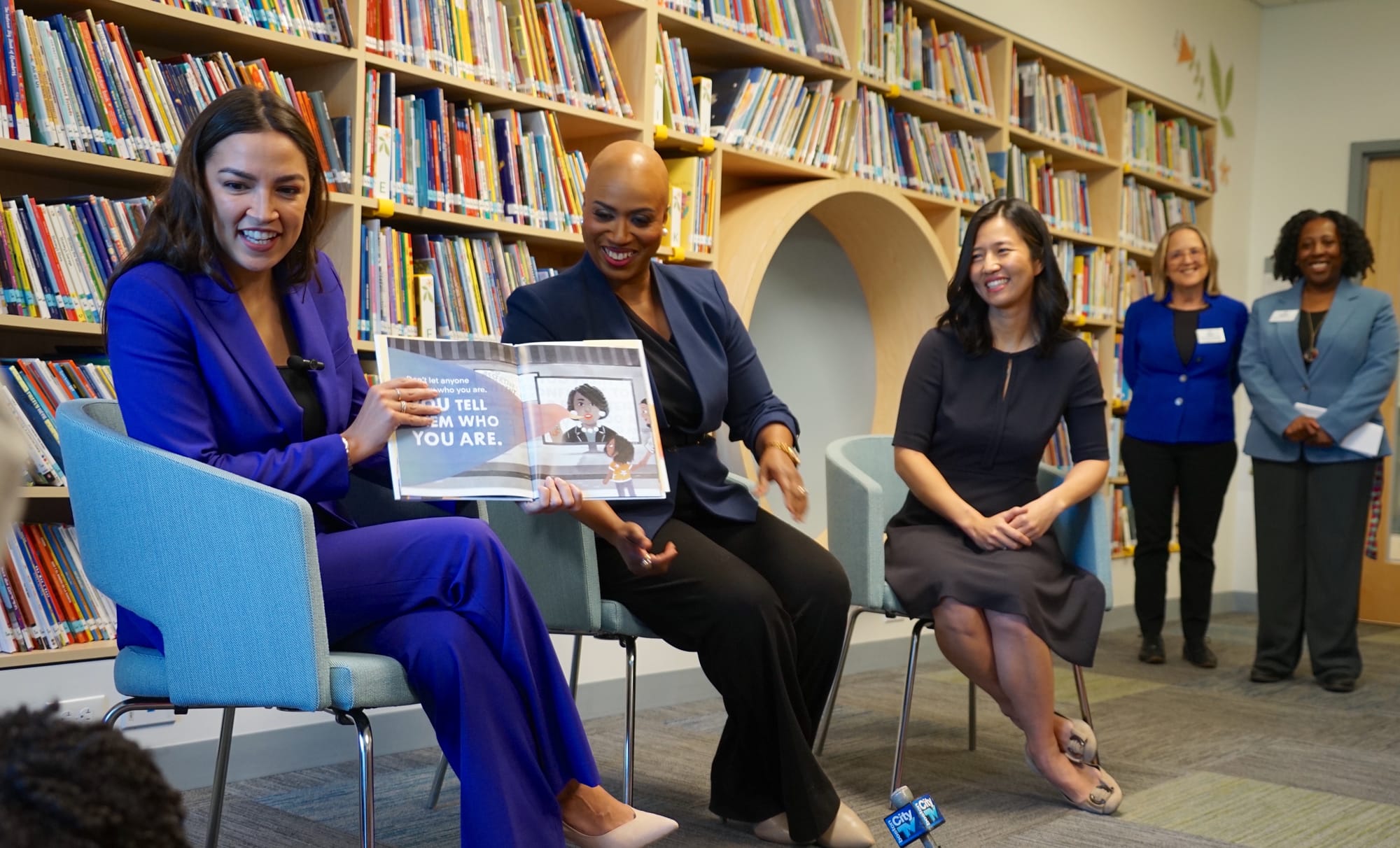 U.S. Reps Axexandria Ocasio-Cortez and Ayanna Pressley and Mayor Michelle Wu read to children at Horizons for Homeless Children in Roxbury. 
