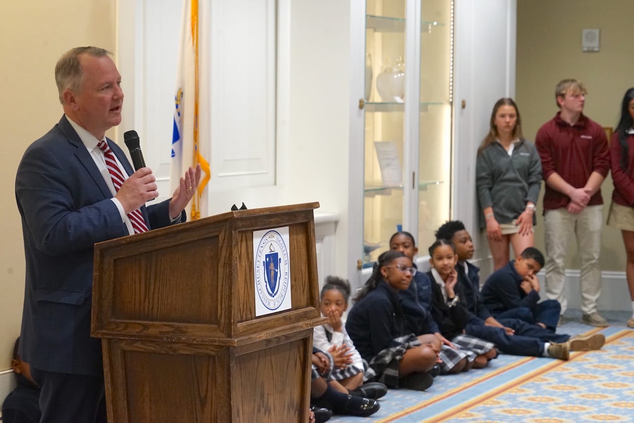 Former Lt. Gov. Tim Murray, who now heads the Worcester Regional Chamber of Commerce, speaks during a lobby day for the Massachusetts Educational Opportunities Council as students look on. (Yawu Miller photo)