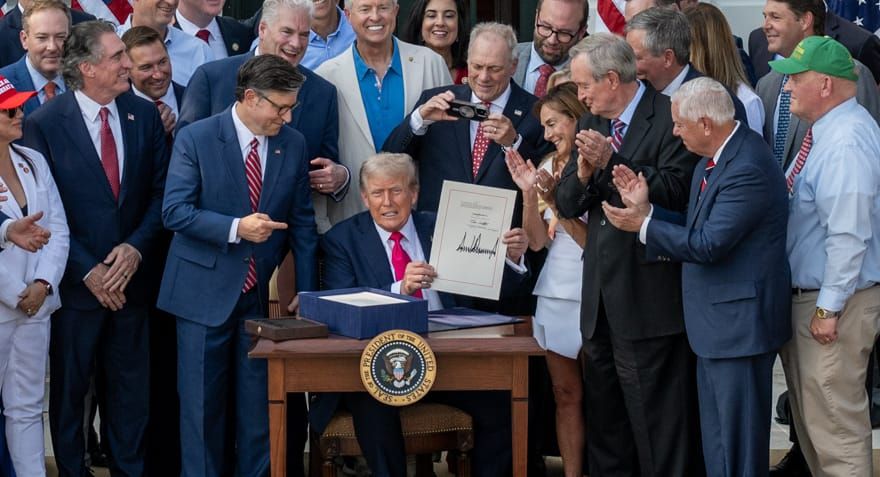 President Trump signs the One Big Beautiful Bill into law in this 2025 photo. The law includes a federal voucher program advocates are hoping to adopt in Massachusetts. (White House photo by 