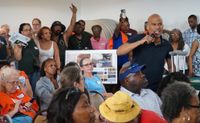 Roxbury resident Carl Williams, holding a microphone, addressed city officials during a June 11 meeting at the William Devine Clubhouse in Franklin Park.