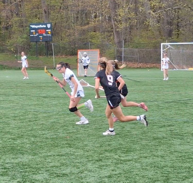Waynflete girls fall short against powerhouse Wells