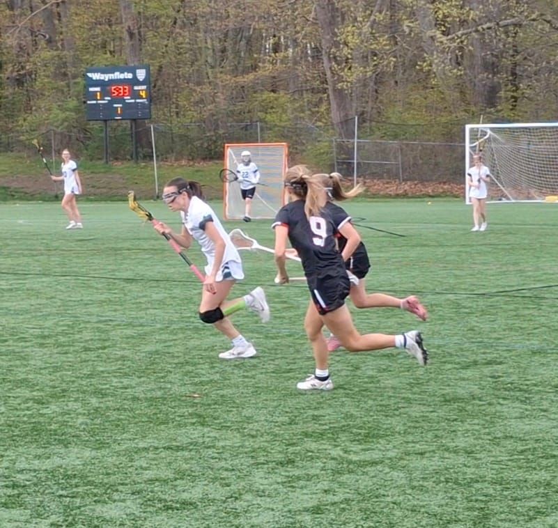 Waynflete girls fall short against powerhouse Wells