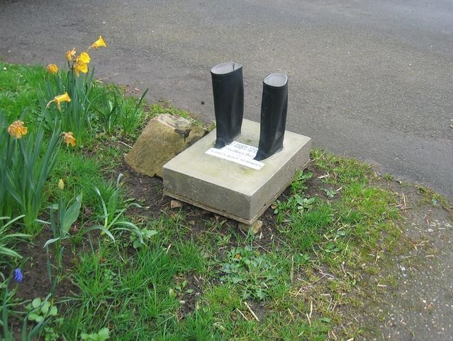 Boots in cement or concrete