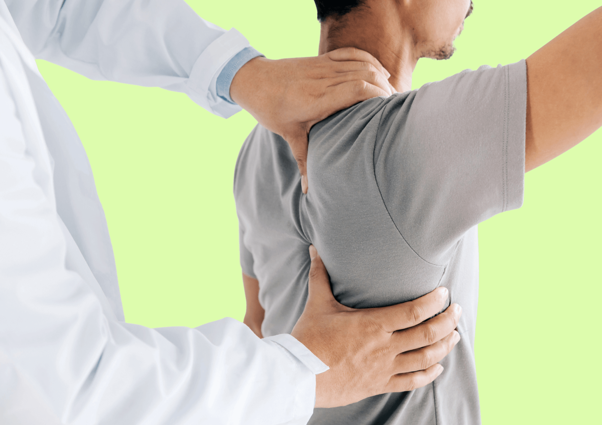 Doctor examines patient with back pain.