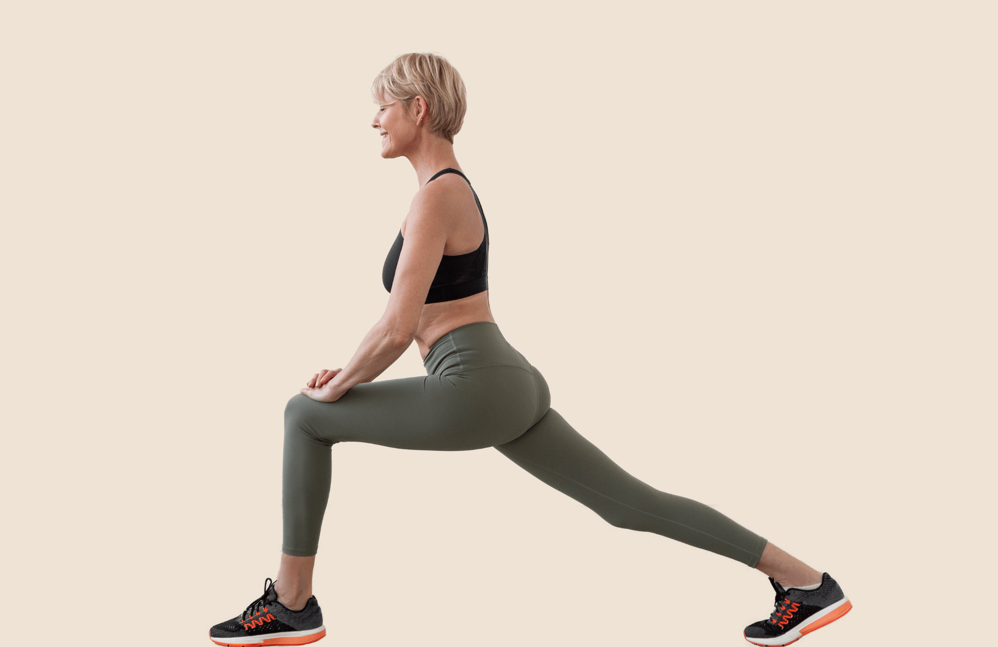 Middle aged woman doing yoga pose.
