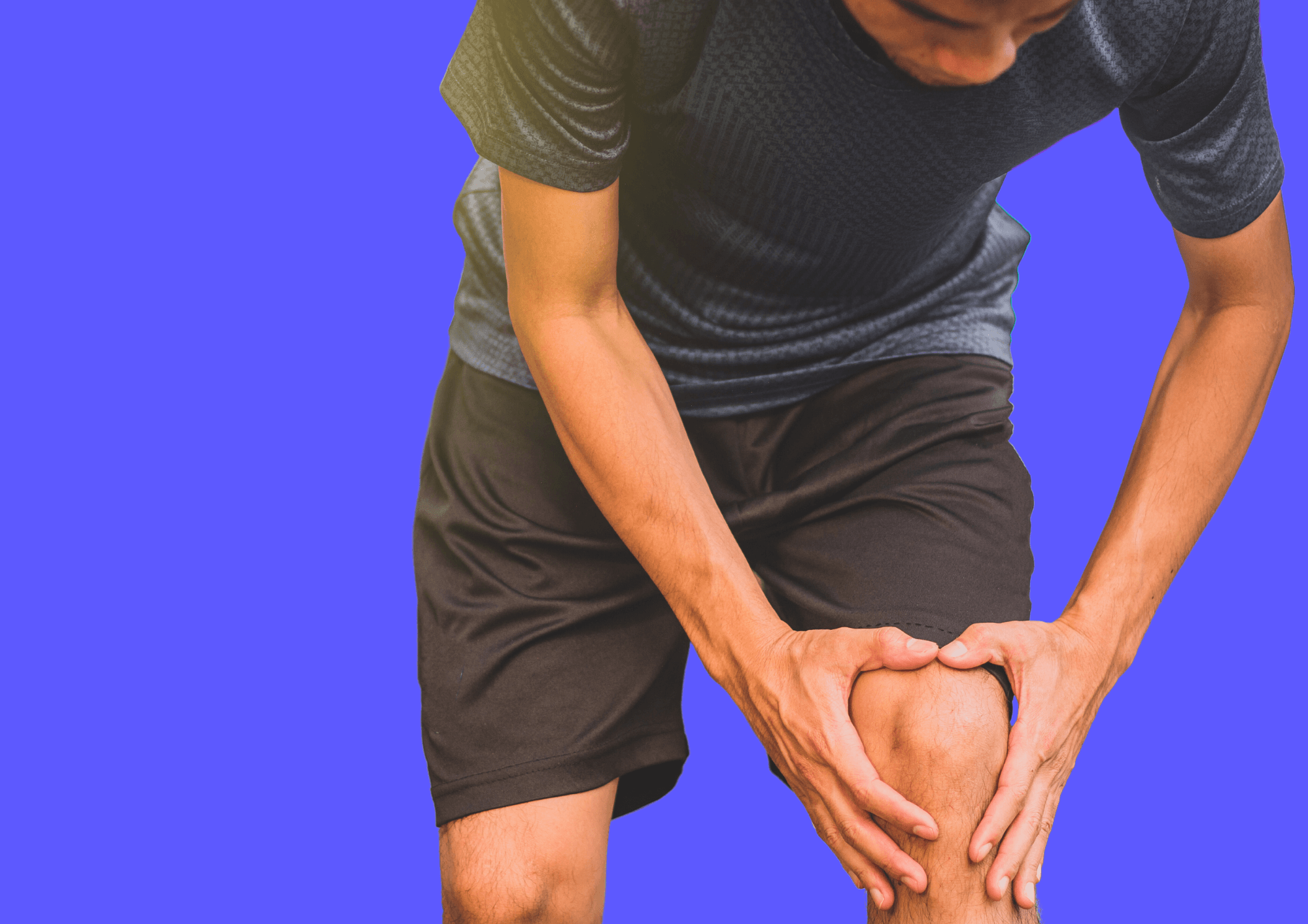 Man holds onto his knee.