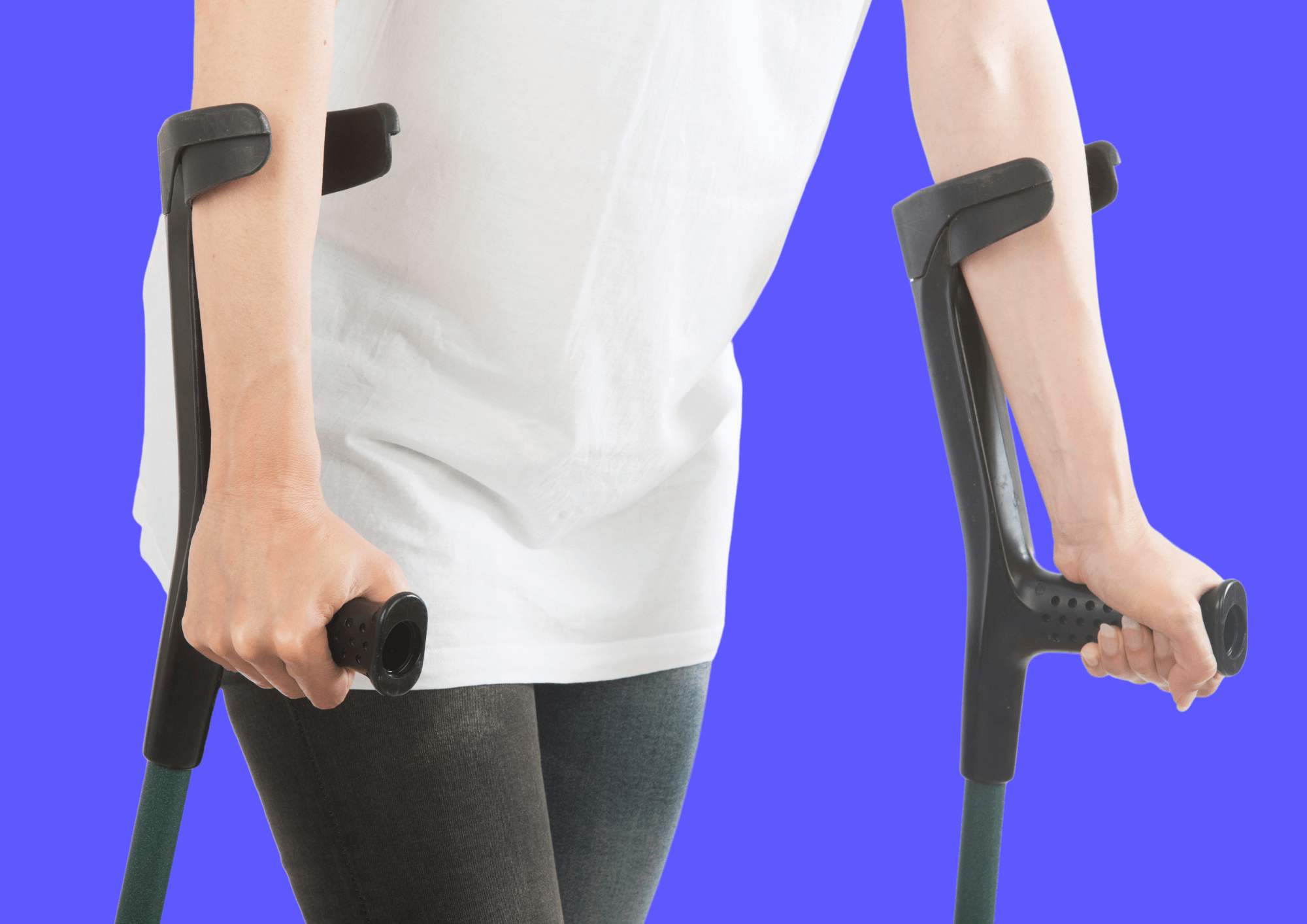 Person walking with crutches after hip replacement surgery.