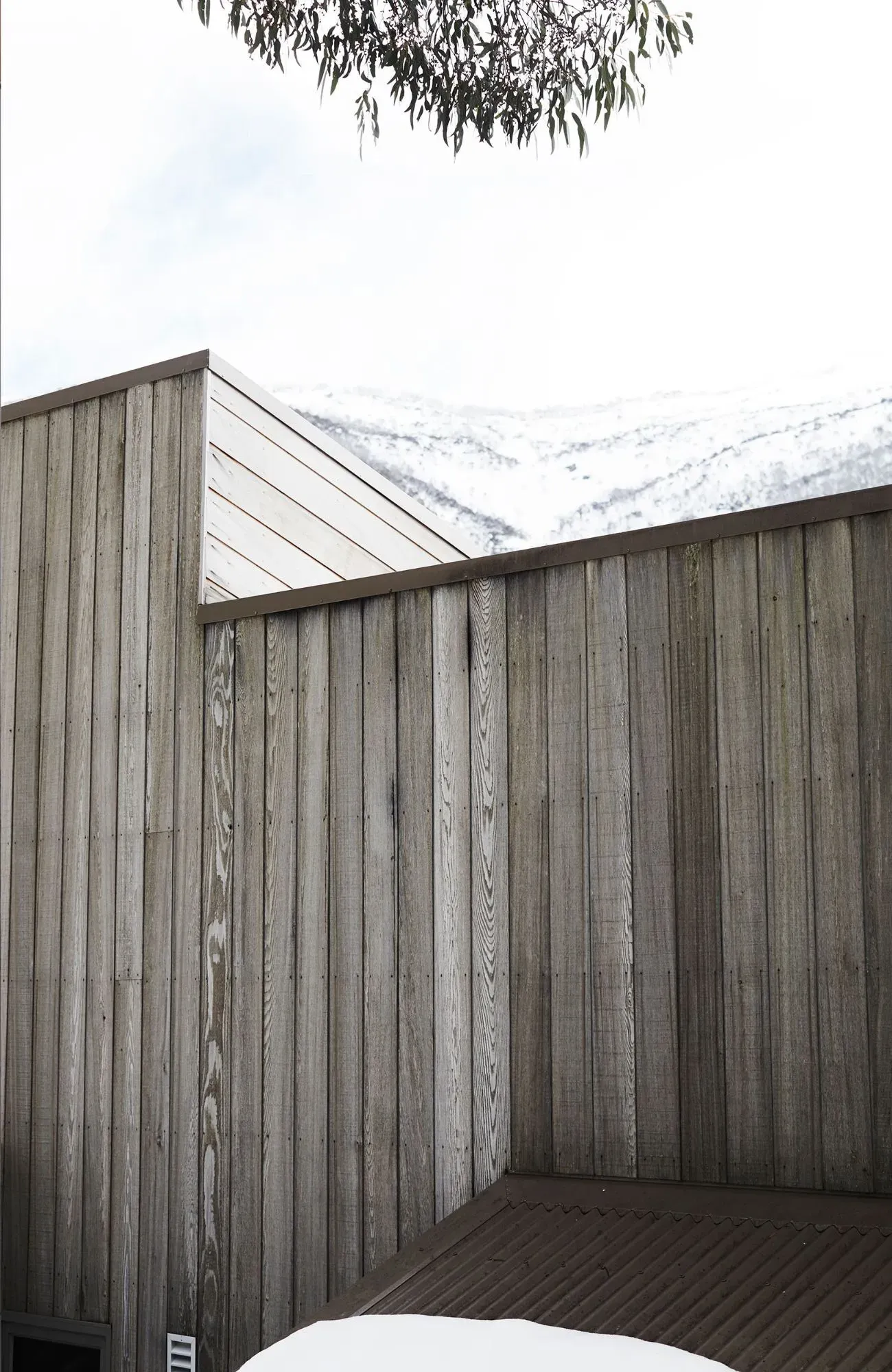 Cedar Cabin by Nicholas Gurney & Monique Easton. Detailed view of exposed timber facade.
