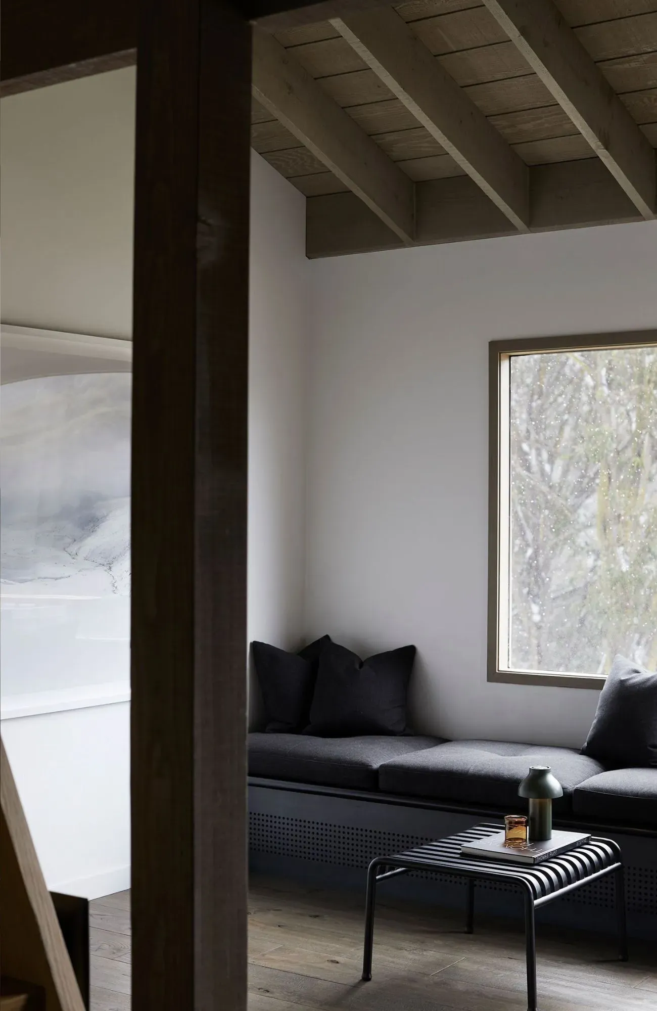 Cedar Cabin by Nicholas Gurney & Monique Easton. Styled booth seating situated under scenic window.