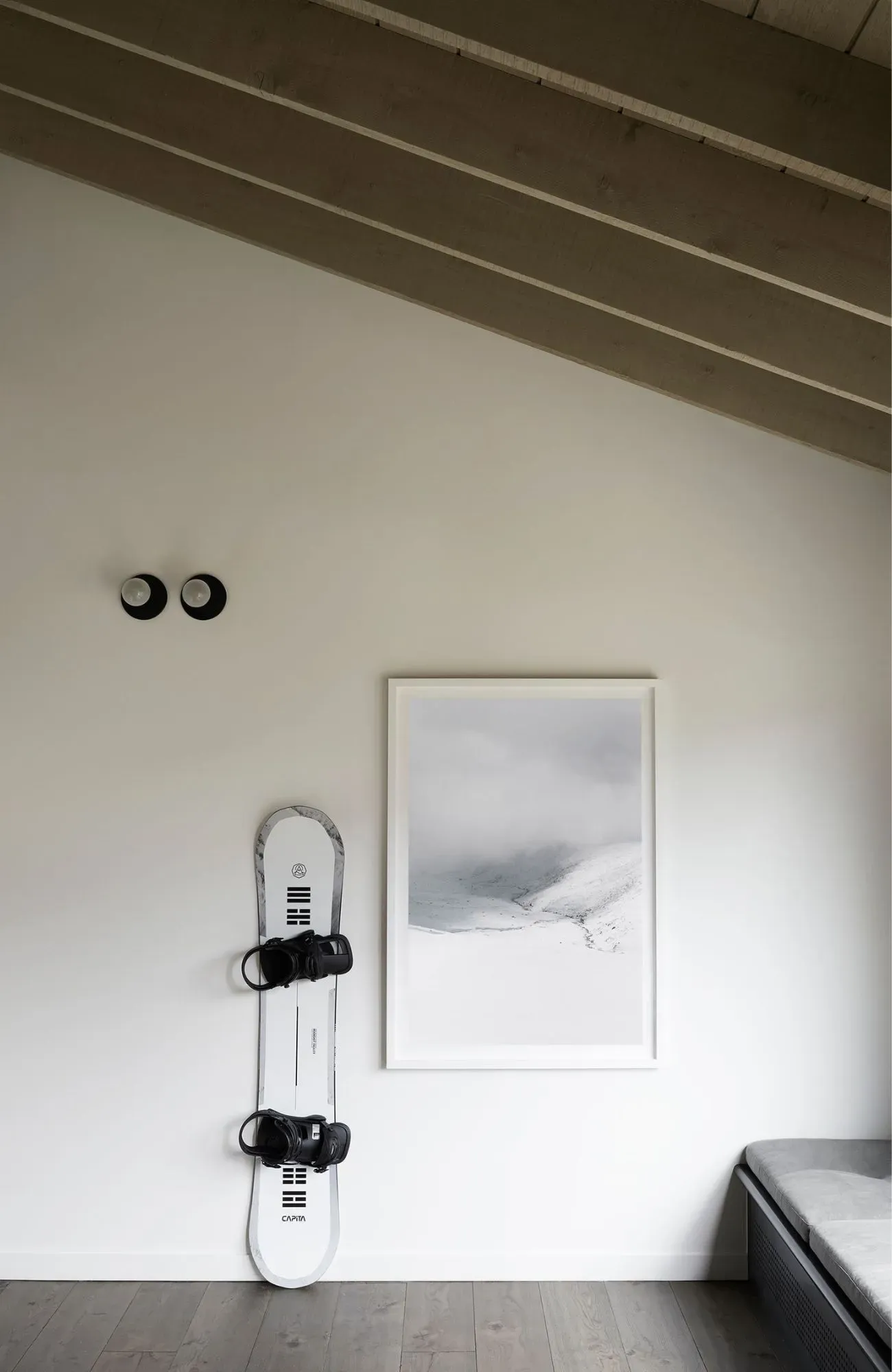 Cedar Cabin by Nicholas Gurney & Monique Easton. Snow board and framed mountain portrait.