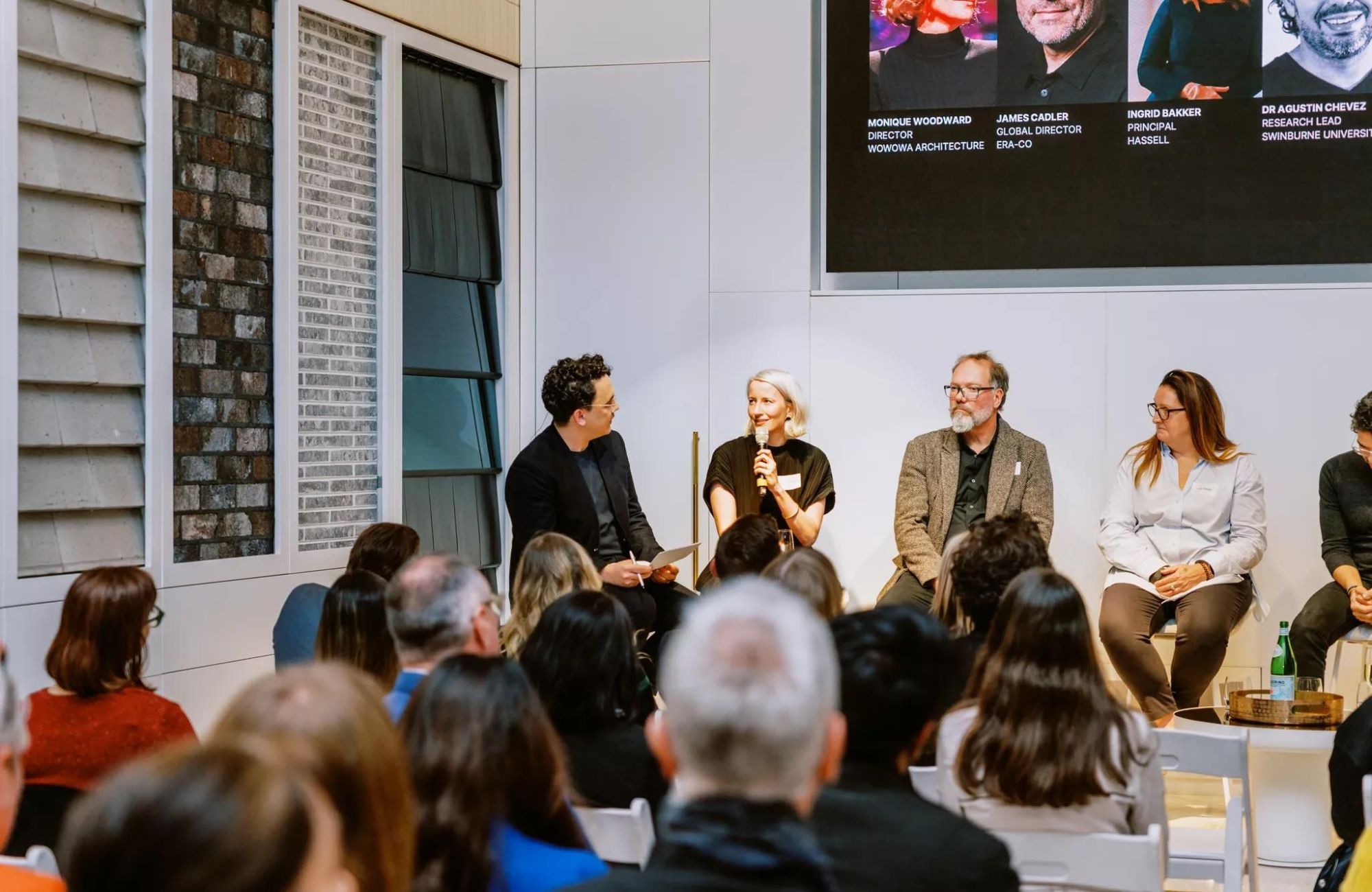 CO-architecture I The Future of Work Melbourne. Panel discussion (background) guests (foreground)
