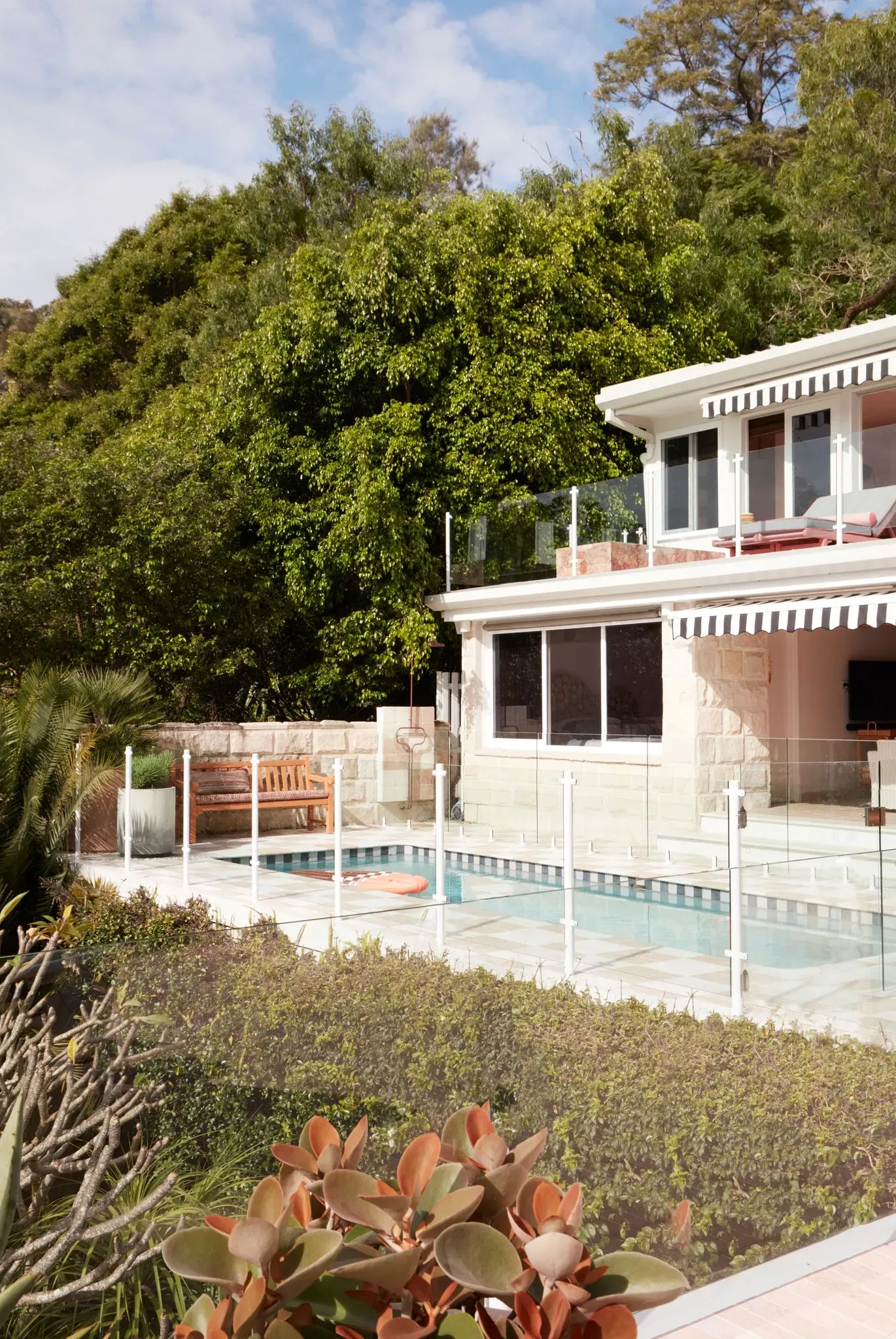 La Palma by YSG Studio. Ground level view to outdoor pool