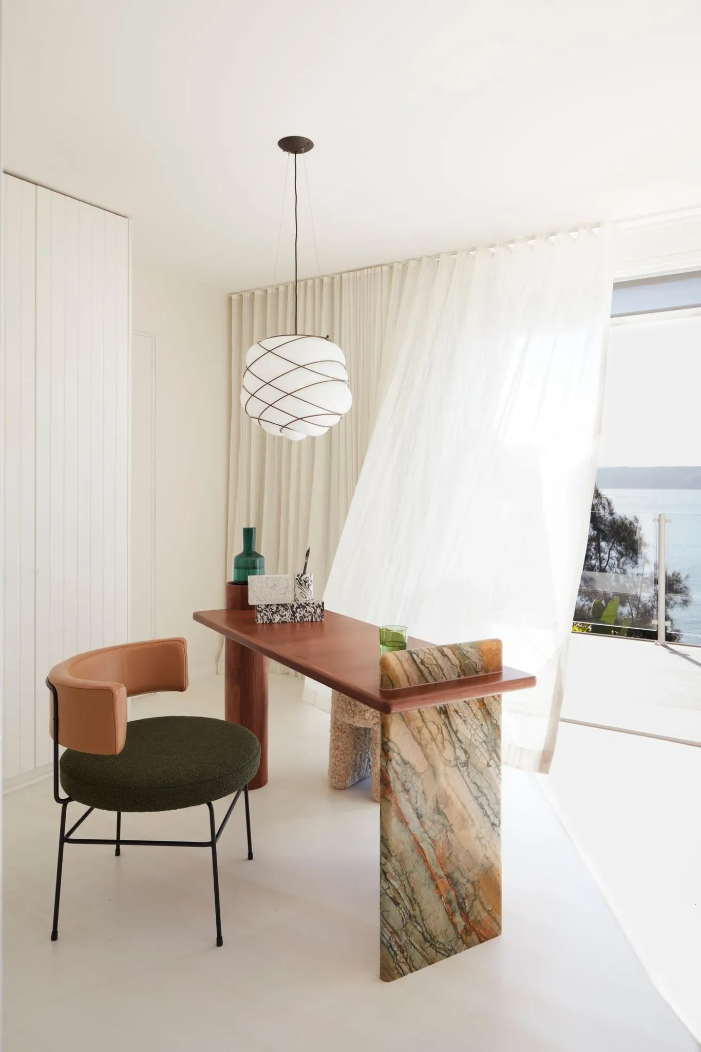 La Palma by YSG Studio. Private workspace featuring custom marble and timber desk