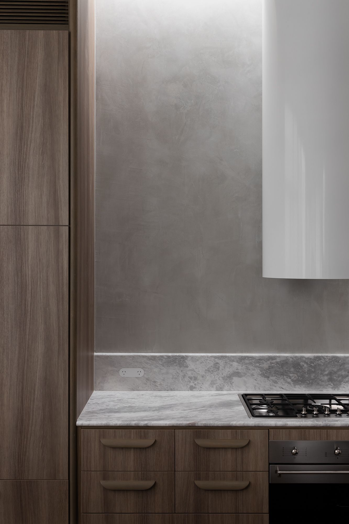 Ripponlea House by Luke Fry Architecture and Interior Design. Kitchen featuring European oak, natural stone, concrete material palette 