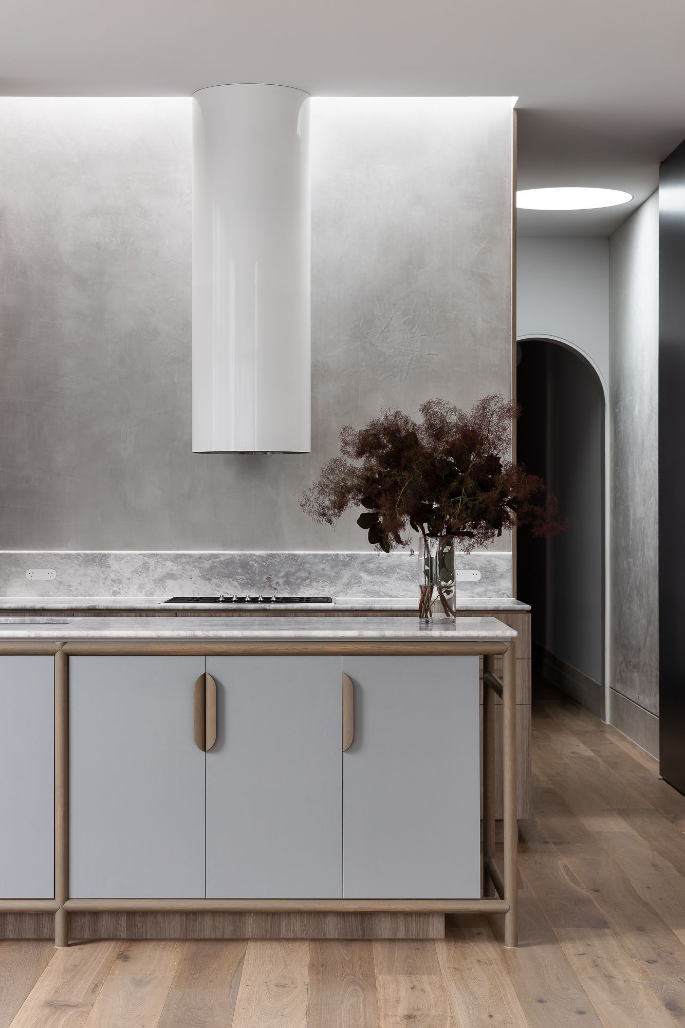 Ripponlea House by Luke Fry Architecture and Interior Design. Kitchen featuring European oak, natural stone, concrete material palette 
