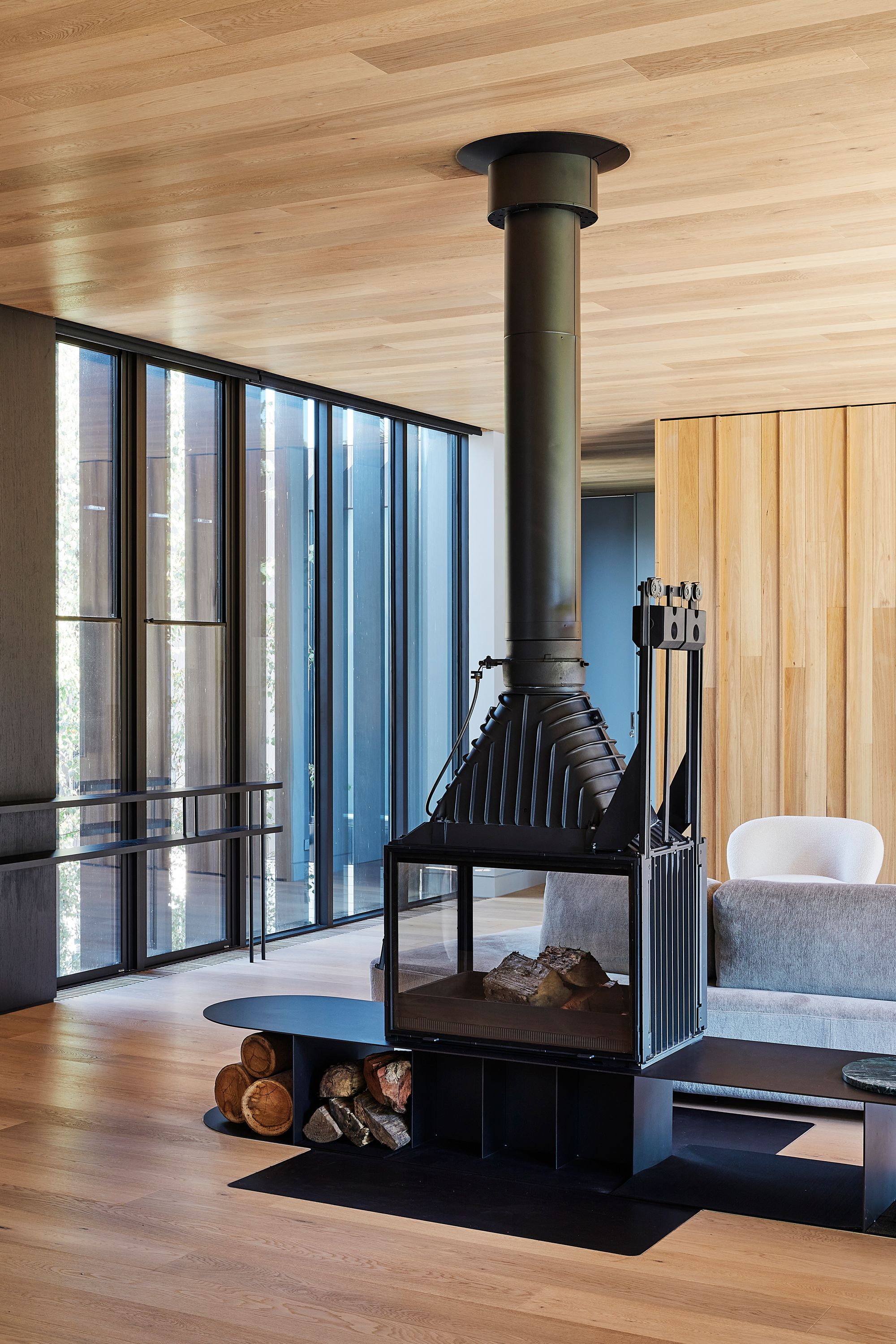 Brimar House by Michael Ong Design Office. Living room with fireplace. 