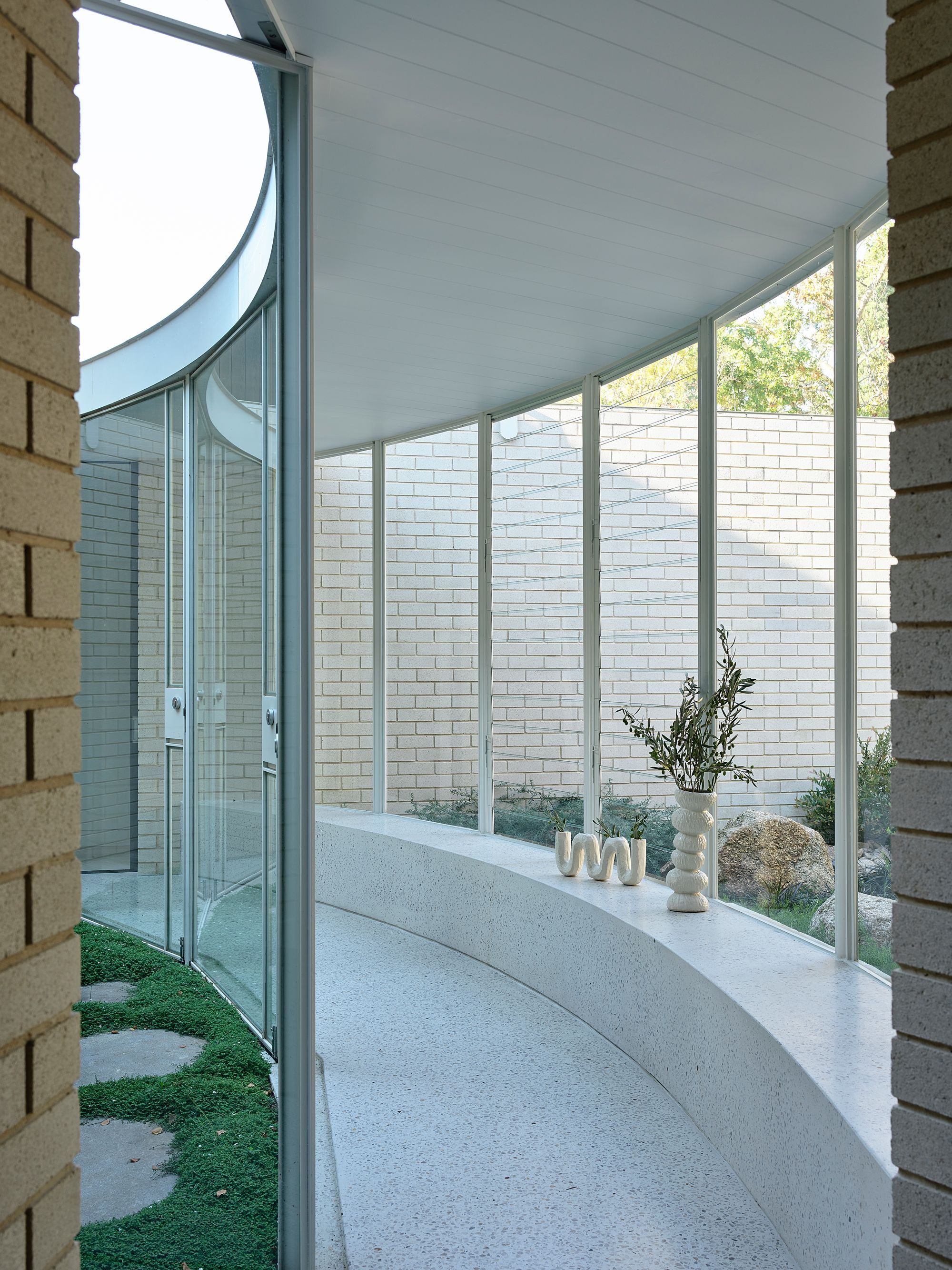 Brimar House by Michael Ong Design Office. Passage through to guest floor, blending indoor and outdoor spaces. 